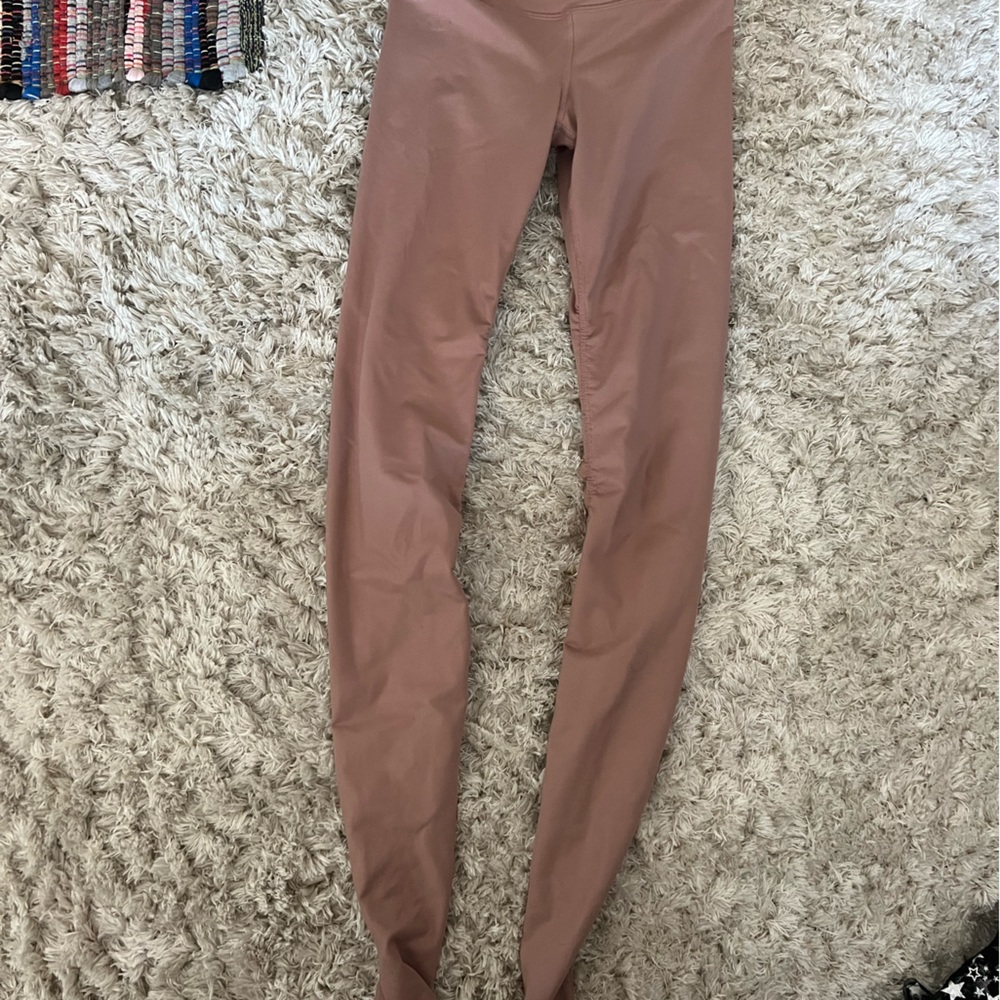 Light pink Alo leggings. Long leggings. In good used condition.